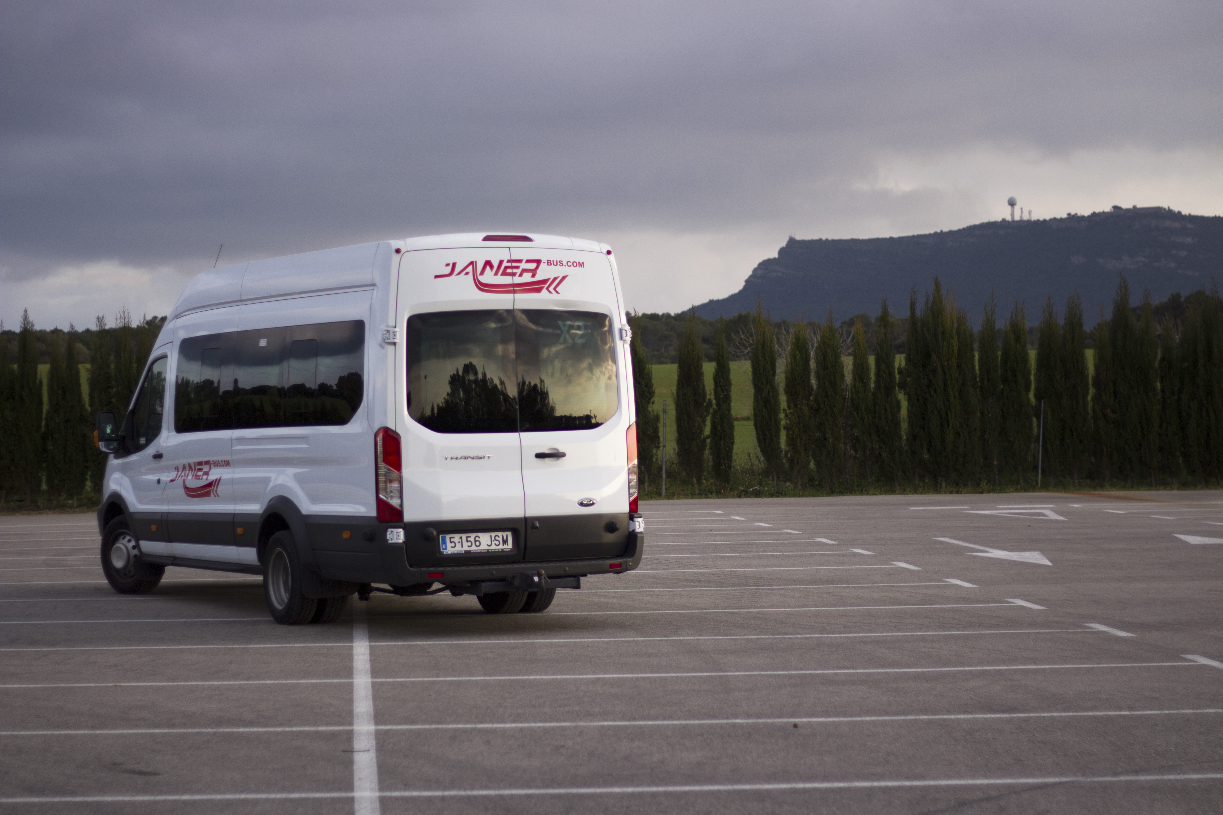Janer Bus vehicle on a coastal road in Mallorca